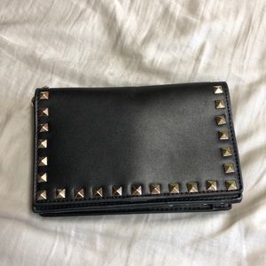 Black clutch with gold studs